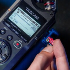 TASCAM_DR-40XP_-_4-Channel_32-Bit_Float_Portable_Field_Recorder_with_USB-C_Interface_and_Adjustable_Mics_-_14_Lifestyle_2_Lare_Recording_Capacity_via_Micro_SDXC