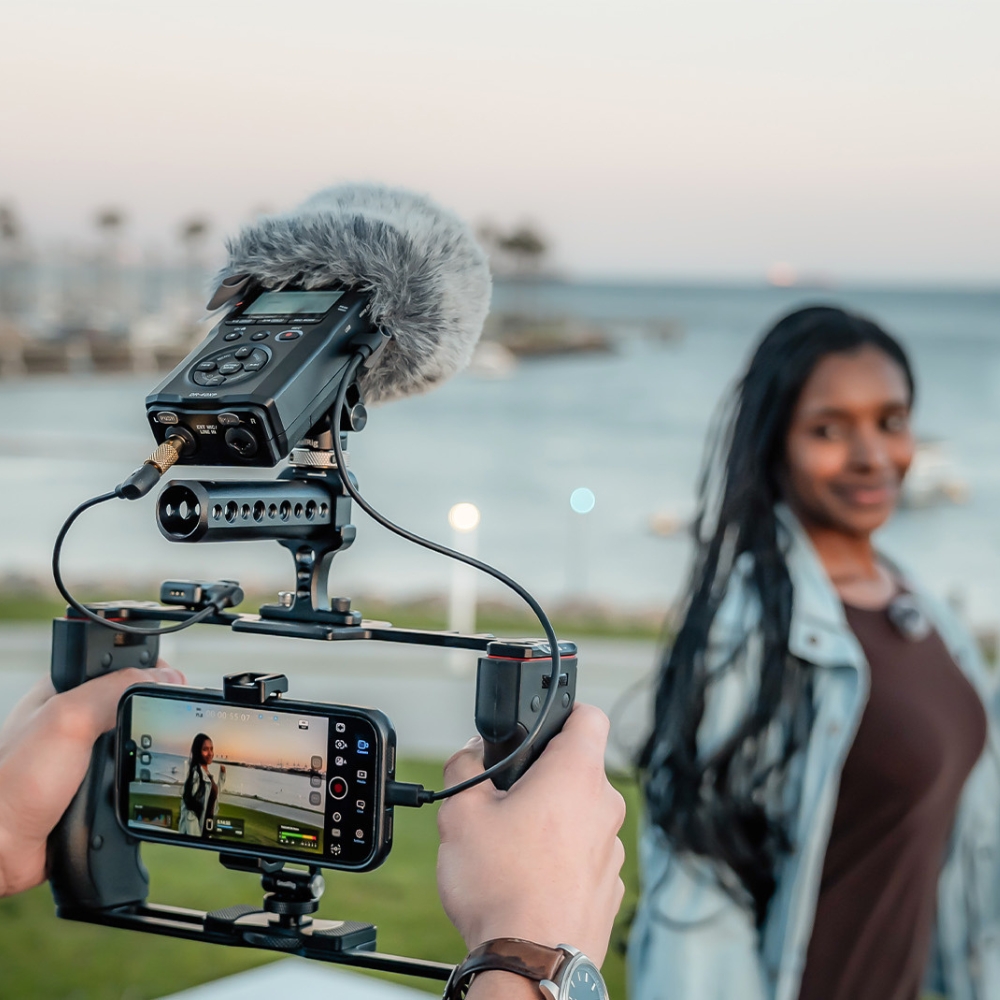 TASCAM_DR-40XP_-_4-Channel_32-Bit_Float_Portable_Field_Recorder_with_USB-C_Interface_and_Adjustable_Mics_-_18_Lifestyle_6_Vlogging_Parallax